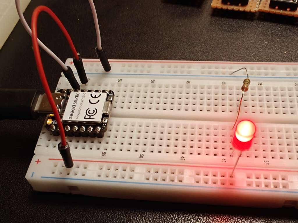 Single LED being tested on a breadboard.